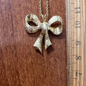 Elegant Gold Bow Pendant Necklace